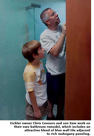 conners and son working on bathroom
