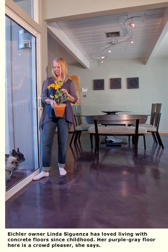 woman standing on floor by sliding glass doors