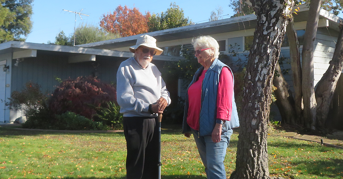 Joe and Susan in front of an Eichler Home