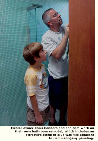 conners and son working on bathroom