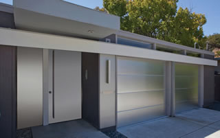 Northgate also installed this custom garage door of anodized aluminum with brushed finish.