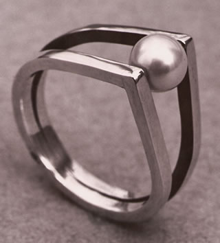 The rolling pearl ring by Renk (silver and rolling pearl, 1954). 