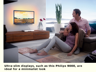 couple watching flat screen on wall